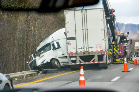 Aftermath of a Texas truck accident with an 18-wheeler driving off the road